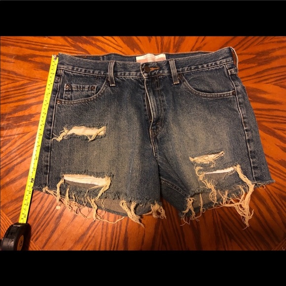 Pants - Vintage distressed blue jeans shorts.